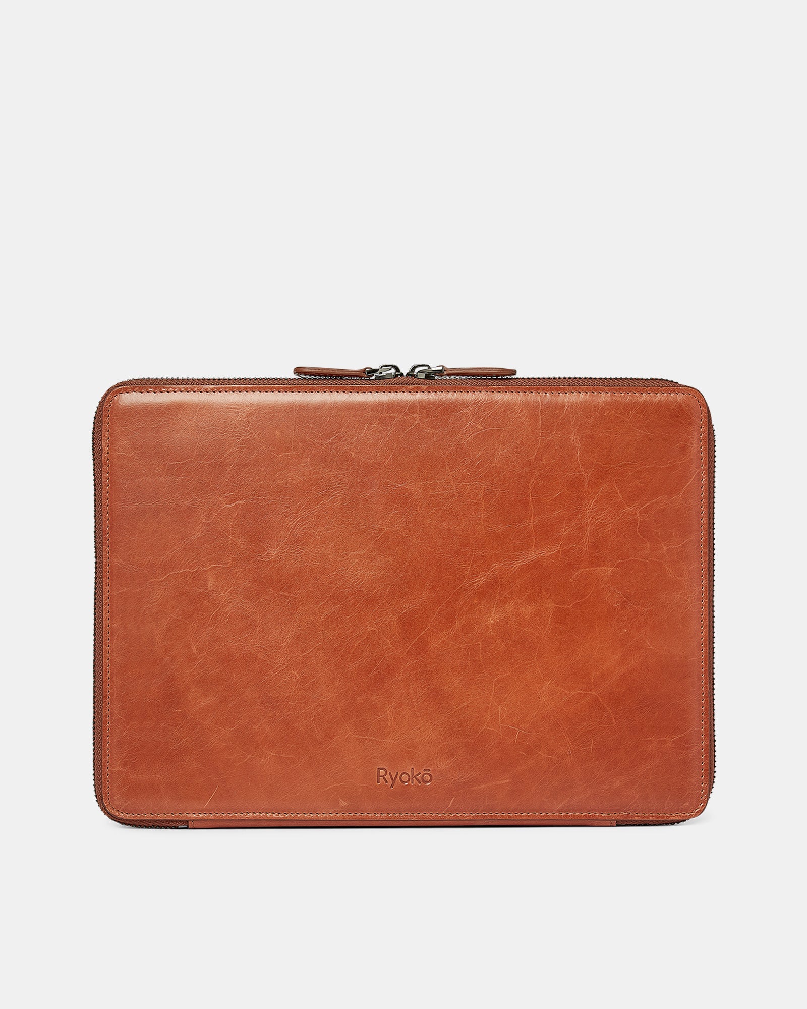 Personalize with your name monogrammed on the Premium Japanese Full Grain Vegetable Tanned Leather cover.